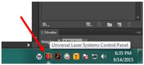 Windows taskbar with the Universal Laser Systems Control Panel icon in the lower right corner indicated by a red arrow