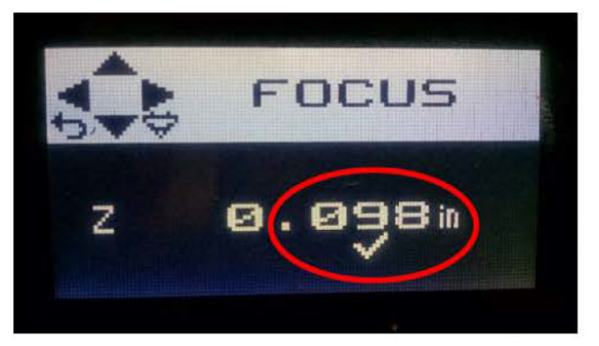 Laser cutter display showing FOCUS mode with the Z height value of 0.098 inches circled in red